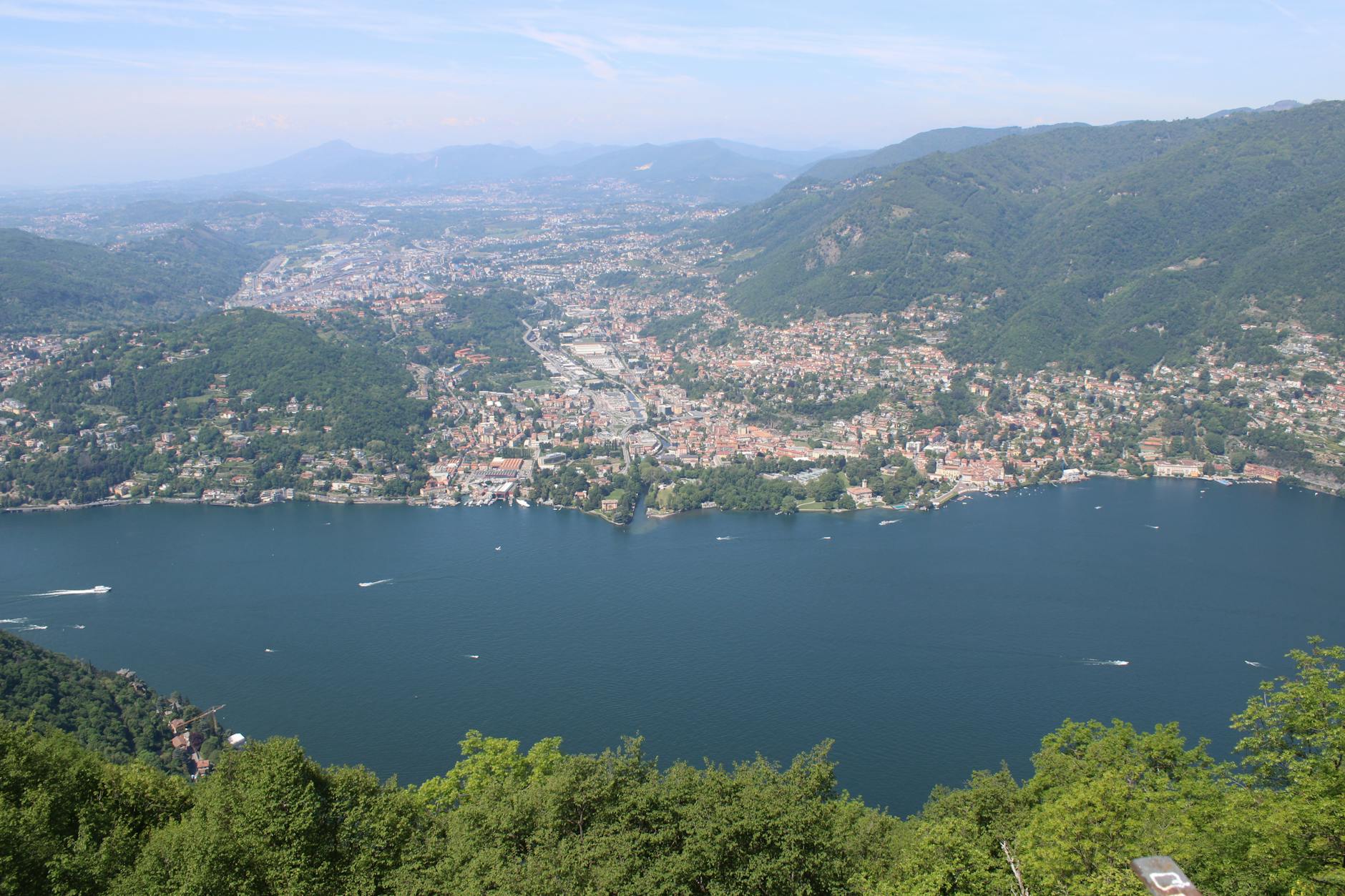 A breathtaking aerial view of Lake Como and surrounding mountains in Italy.