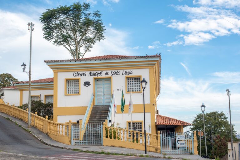 The historic City Council building of Santa Luzia, showcasing colonial architecture against a blue sky.